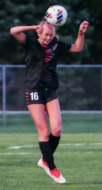Muskego's Klara Muench (16) elevates for a header during the match at home against Waunakee, Friday, April 19, 2024.
