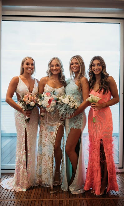A group of Franklin High School junior cheerleaders attend prom on Saturday, April 20, 2024, at Discovery World.