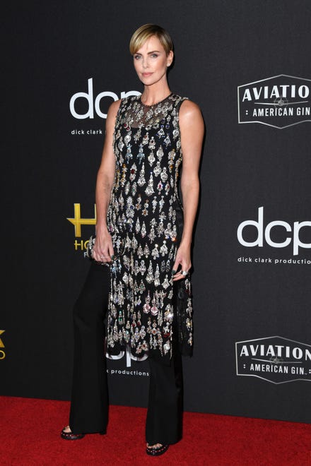 While being awarded the Hollywood Career Achievement Award, Theron played it cool with black Alexander McQueen trousers with a flowing patterned top at the 23rd annual Hollywood Film Awards in 2019.